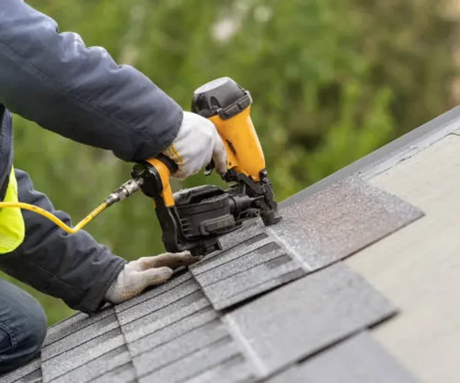 4 Square Roofing crew tearing off old shingles